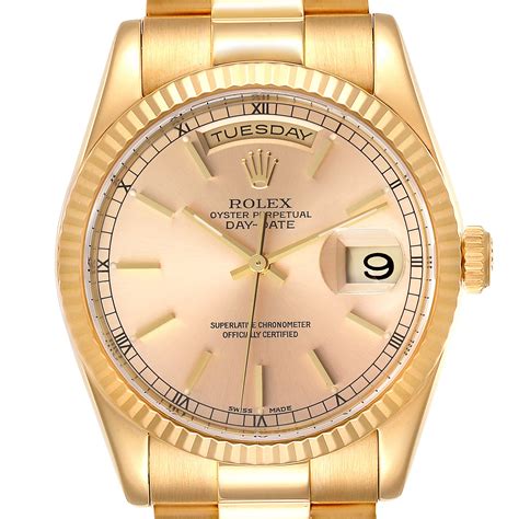 rolex day date gold 36.